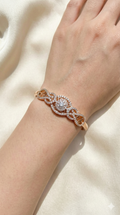 young woman wearing gold-plated hypoallergenic bracelet, showing their anti-tarnish shine suitable for sensitive skin and daily wear