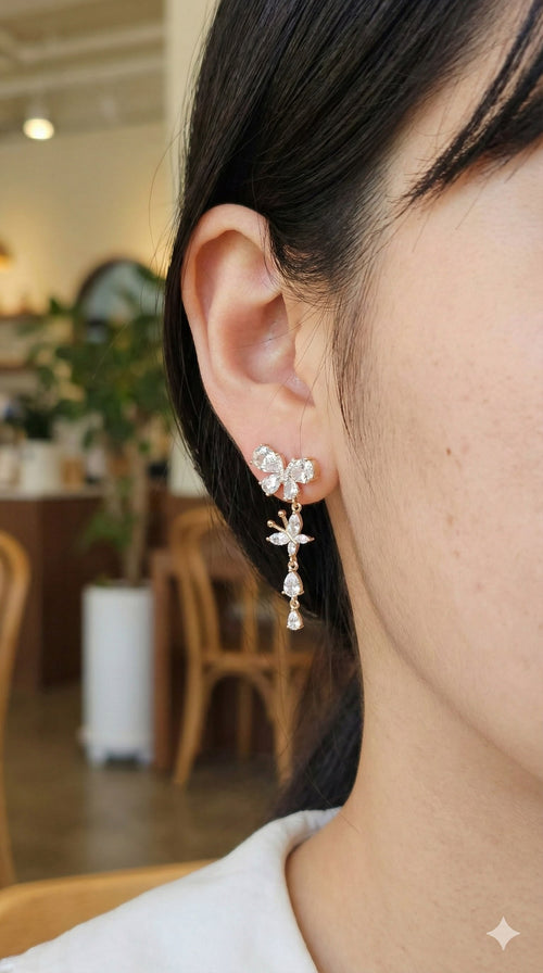 young woman wearing gold-plated hypoallergenic earrings, showing their anti-tarnish shine suitable for sensitive skin and daily wear