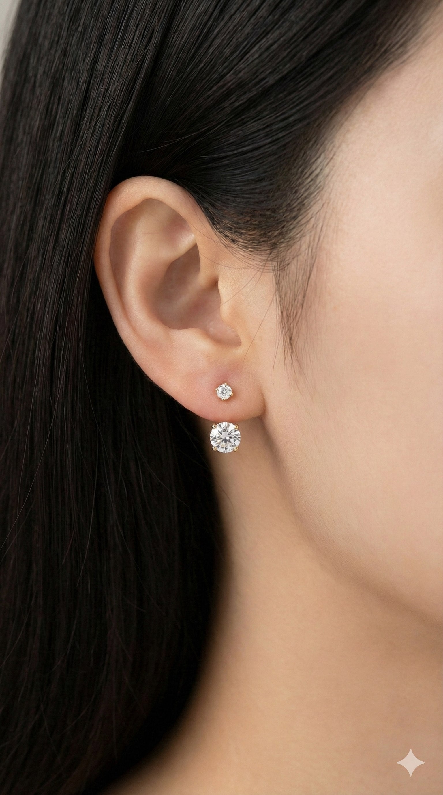 young woman wearing gold-plated hypoallergenic earrings, showing their anti-tarnish shine suitable for sensitive skin and daily wear