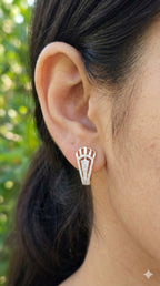young woman wearing gold-plated hypoallergenic earrings, showing their anti-tarnish shine suitable for sensitive skin and daily wear