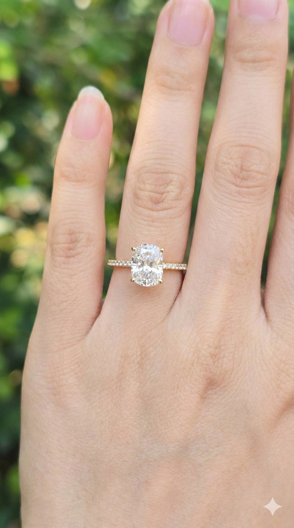 young woman wearing gold-plated hypoallergenic finger ring, showing their anti-tarnish shine suitable for sensitive skin and daily wear