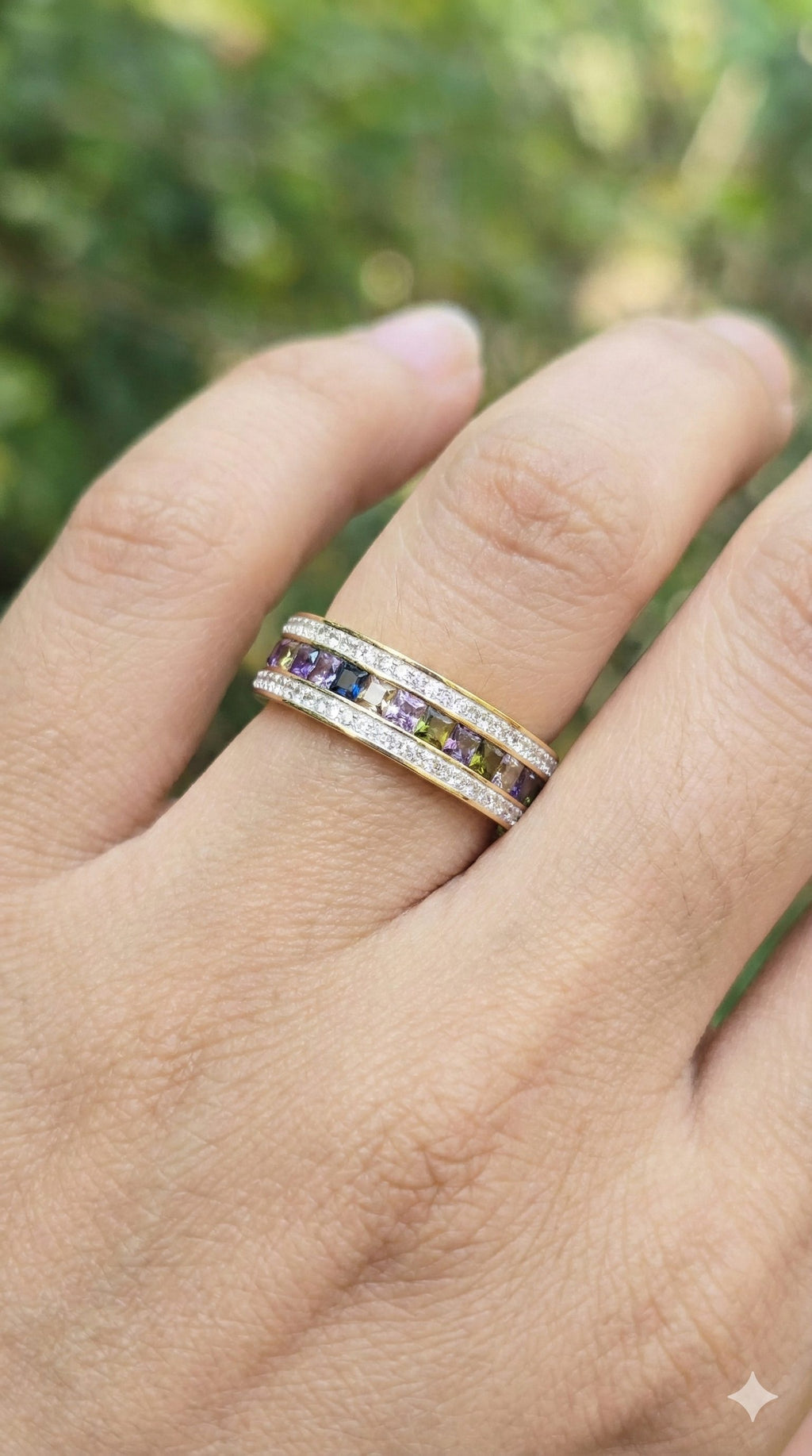 young woman wearing gold-plated hypoallergenic finger ring, showing their anti-tarnish shine suitable for sensitive skin and daily wear