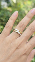 young woman wearing gold-plated hypoallergenic finger ring, showing their anti-tarnish shine suitable for sensitive skin and daily wear