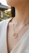 young woman wearing gold-plated hypoallergenic necklace, showing their anti-tarnish shine suitable for sensitive skin and daily wear