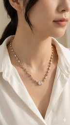 young woman wearing gold-plated hypoallergenic necklace, showing their anti-tarnish shine suitable for sensitive skin and daily wear