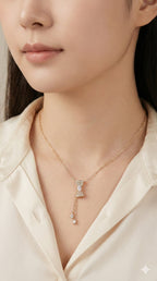 young woman wearing gold-plated hypoallergenic necklace, showing their anti-tarnish shine suitable for sensitive skin and daily wear