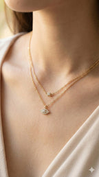 young woman wearing gold-plated hypoallergenic necklace, showing their anti-tarnish shine suitable for sensitive skin and daily wear
