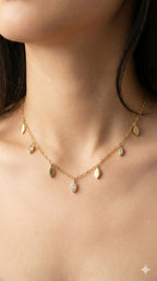 young woman wearing gold-plated hypoallergenic necklace, showing their anti-tarnish shine suitable for sensitive skin and daily wear