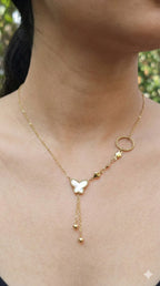 young woman wearing gold-plated hypoallergenic necklace, showing their anti-tarnish shine suitable for sensitive skin and daily wear