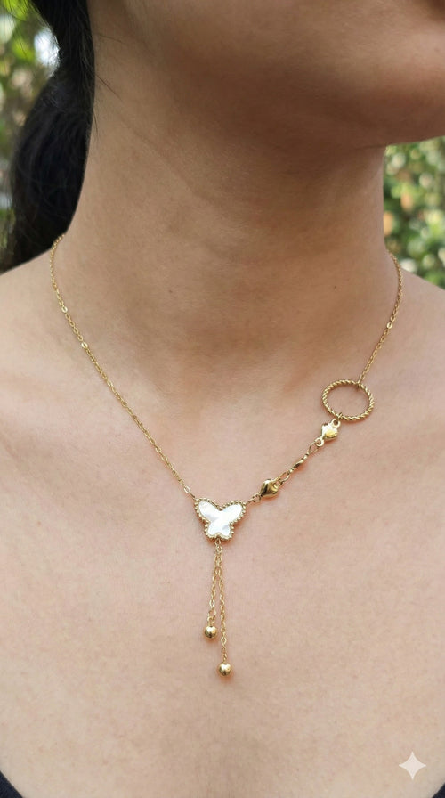 young woman wearing gold-plated hypoallergenic necklace, showing their anti-tarnish shine suitable for sensitive skin and daily wear